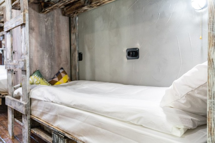 Imagen de la habitación del Hotel Moomidol Hostel. Foto 17