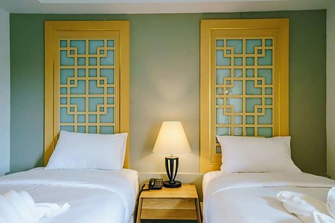 Imagen de la habitación del Hotel Moon Dragon. Foto 13