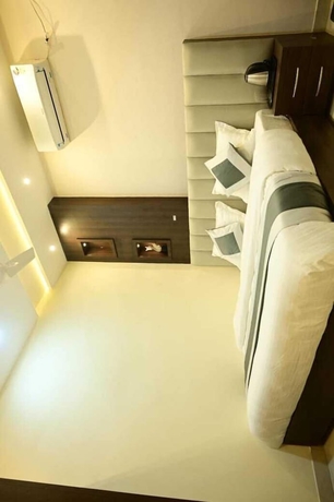 Imagen de la habitación del Hotel Moon High Stay. Foto 10