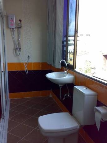 Imagen de la habitación del Hotel Moon House At Clock Tower. Foto 17