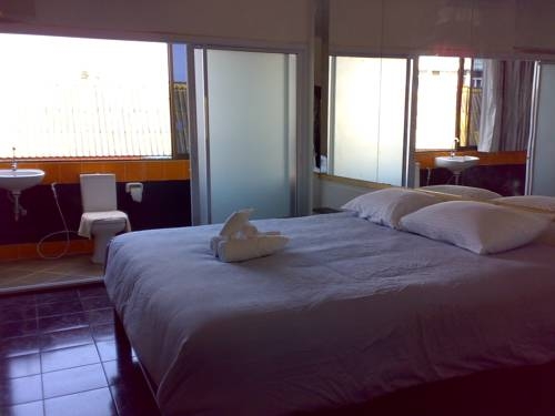 Imagen de la habitación del Hotel Moon House At Clock Tower. Foto 18