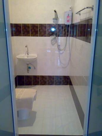 Imagen de la habitación del Hotel Moon House At Clock Tower. Foto 19