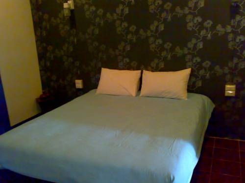 Imagen de la habitación del Hotel Moon House At Clock Tower. Foto 20