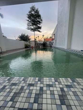 Imagen de la habitación del Hotel Moon House Villa. Foto 2