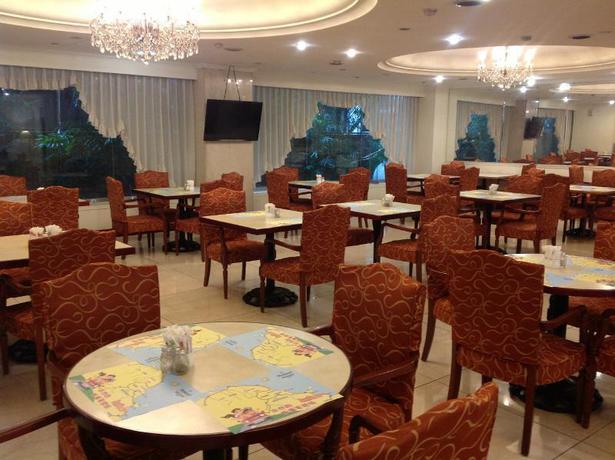 Imagen del bar/restaurante del Hotel Moon Light Hotel. Foto 3