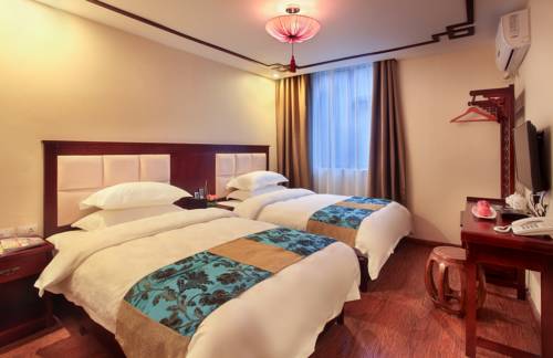 Imagen de la habitación del Hotel Moon Reflection River Lnn. Foto 6