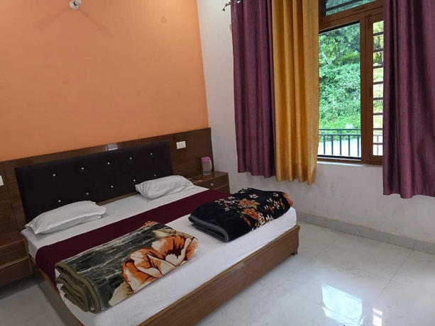 Imagen de la habitación del Hotel Moon Rise, Ukhimath. Foto 13
