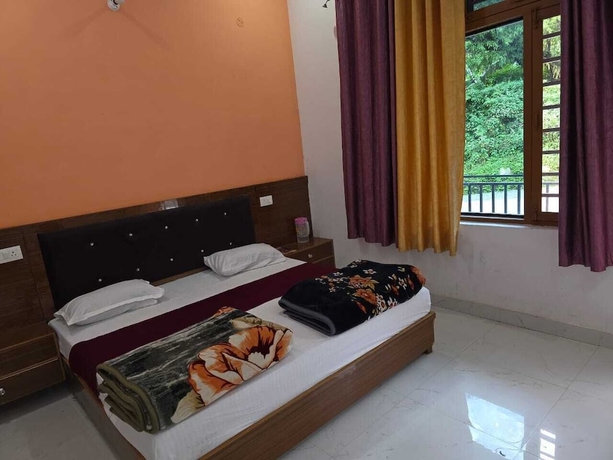 Imagen de la habitación del Hotel Moon Rise, Ukhimath. Foto 14