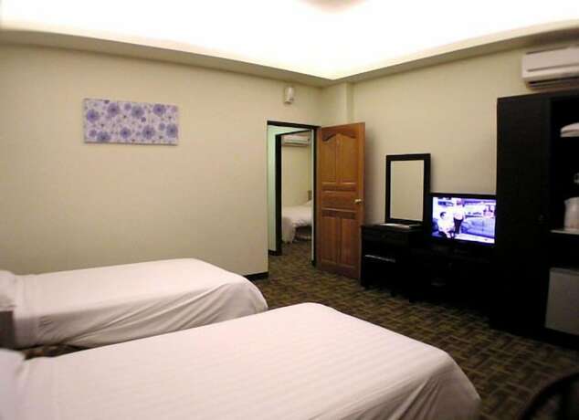 Imagen de la habitación del Hotel Moon Villa. Foto 18