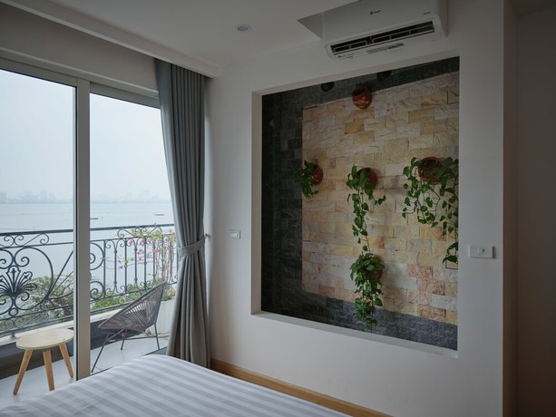 Imagen de la habitación del Hotel MoonLight Tay Ho. Foto 12
