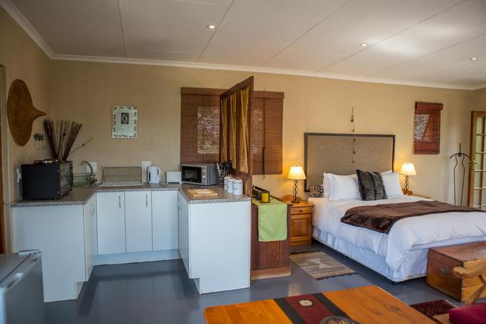 Imagen de la habitación del Hotel Moonflower Cottages. Foto 1