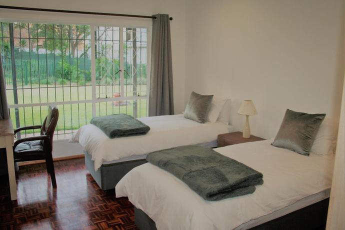 Imagen de la habitación del Hotel Moonflower Cottages. Foto 3