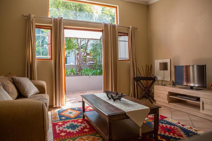 Imagen de la habitación del Hotel Moonflower Cottages. Foto 9