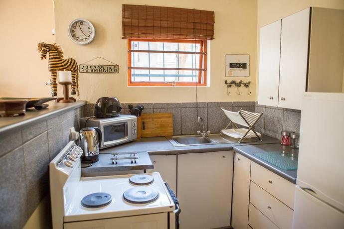 Imagen de la habitación del Hotel Moonflower Cottages. Foto 11