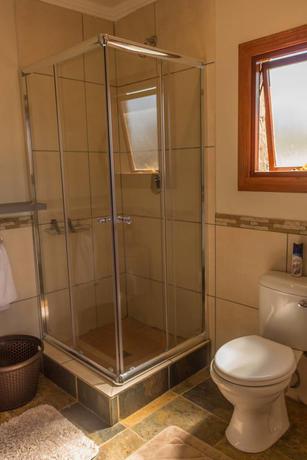 Imagen de la habitación del Hotel Moonflower Cottages. Foto 14