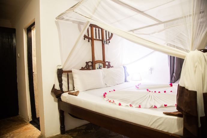 Imagen de la habitación del Hotel Moonshine Uroa Boutique. Foto 2