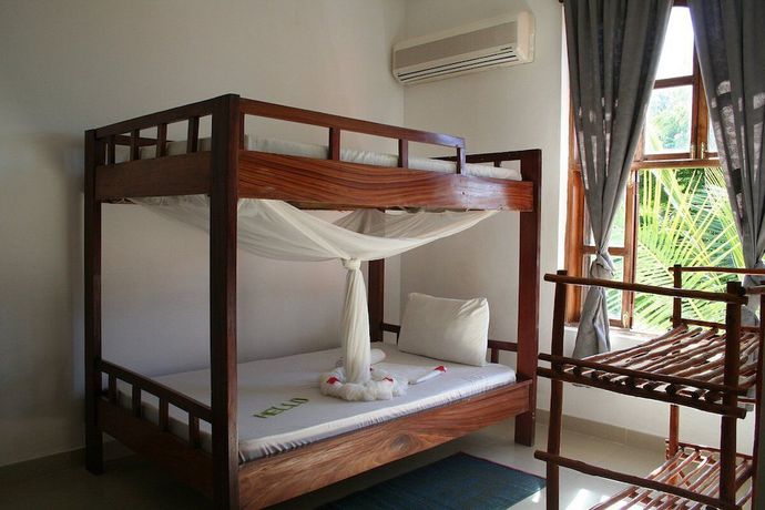 Imagen de la habitación del Hotel Moonshine Uroa Boutique. Foto 8