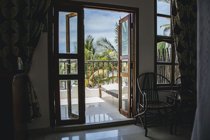 Imagen de la habitación del Hotel Moonshine Uroa Boutique. Foto 12