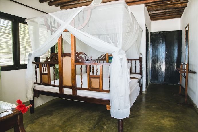 Imagen de la habitación del Hotel Moonshine Uroa Boutique. Foto 13