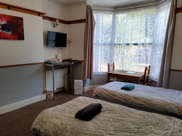 Imagen de la habitación del Hotel Moonside Rooms. Foto 3