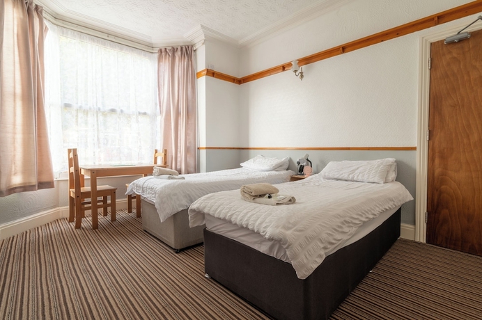 Imagen de la habitación del Hotel Moonside Rooms. Foto 15