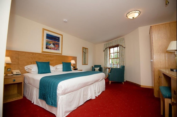 Imagen de la habitación del Hotel Moorings. Foto 11