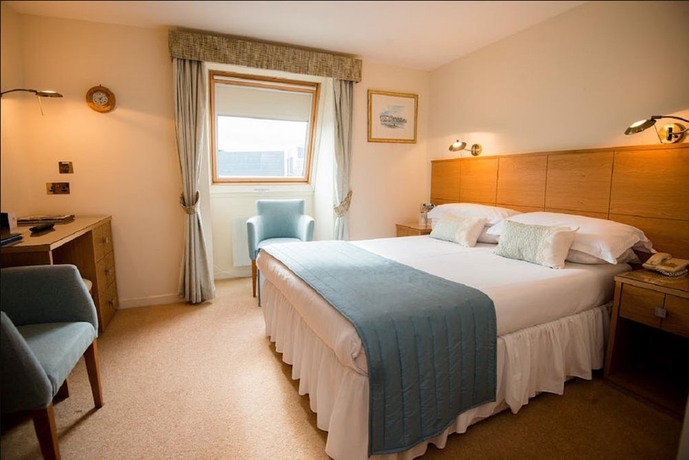 Imagen de la habitación del Hotel Moorings. Foto 13