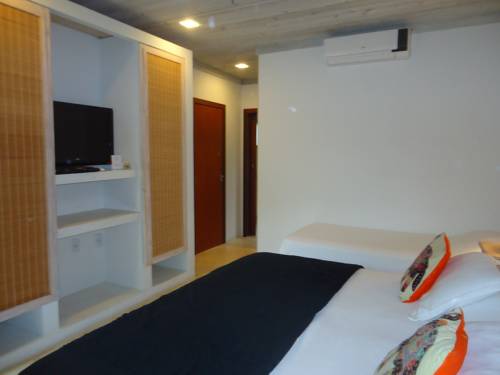 Imagen de la habitación del Hotel Morada Da Praia Do Rosa Pousada. Foto 2