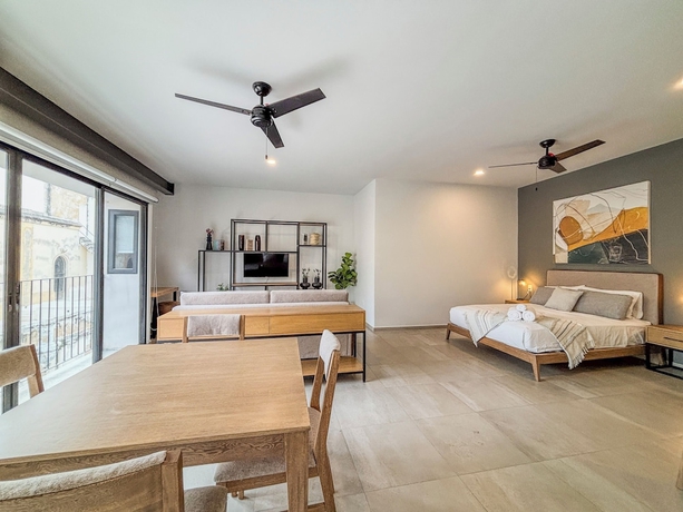 Imagen de la habitación del Hotel Morada Living. Foto 3