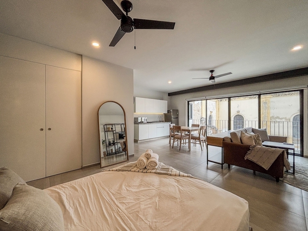 Imagen de la habitación del Hotel Morada Living. Foto 6