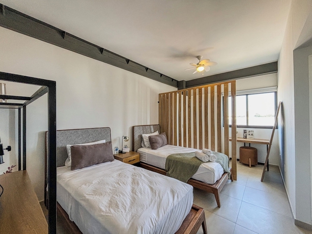 Imagen de la habitación del Hotel Morada Living. Foto 15