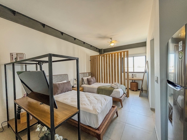 Imagen de la habitación del Hotel Morada Living. Foto 16