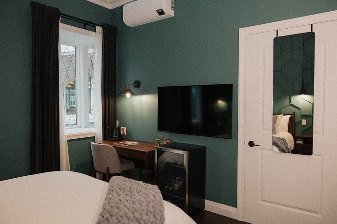 Imagen de la habitación del Hotel Morado. Foto 8