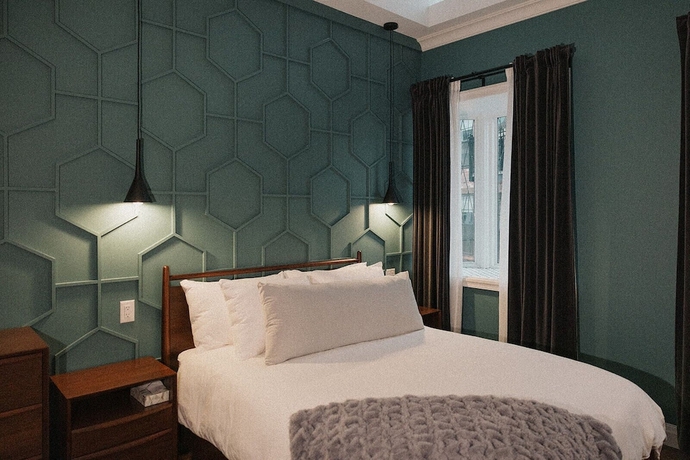 Imagen de la habitación del Hotel Morado. Foto 10