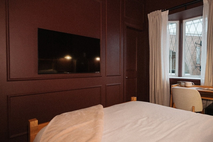 Imagen de la habitación del Hotel Morado. Foto 13