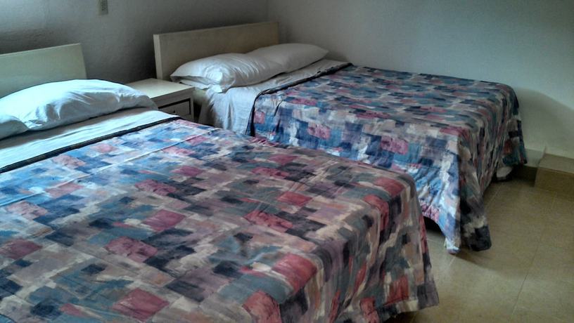 Imagen de la habitación del Hotel Morales Inn. Foto 4