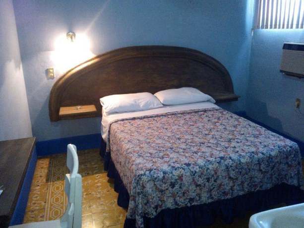 Imagen de la habitación del Hotel Morales Inn. Foto 7
