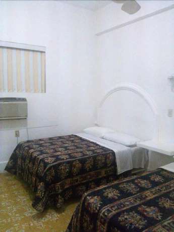 Imagen de la habitación del Hotel Morales Inn. Foto 8