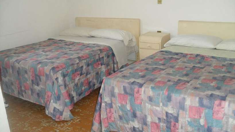Imagen de la habitación del Hotel Morales Inn. Foto 11