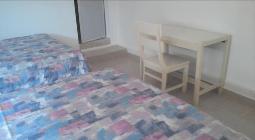 Imagen de la habitación del Hotel Morales Inn. Foto 12