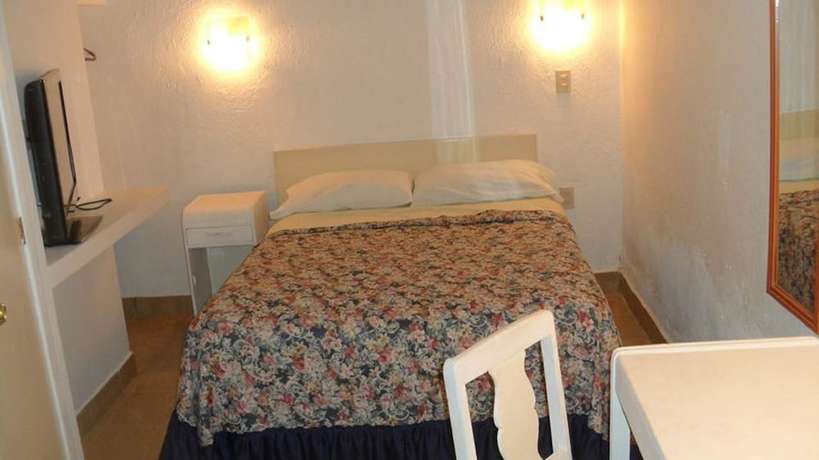 Imagen de la habitación del Hotel Morales Inn. Foto 13