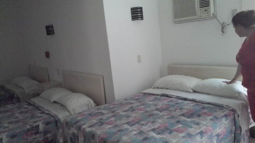 Imagen de la habitación del Hotel Morales Inn. Foto 16