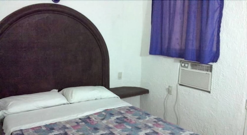 Imagen de la habitación del Hotel Morales Inn. Foto 18