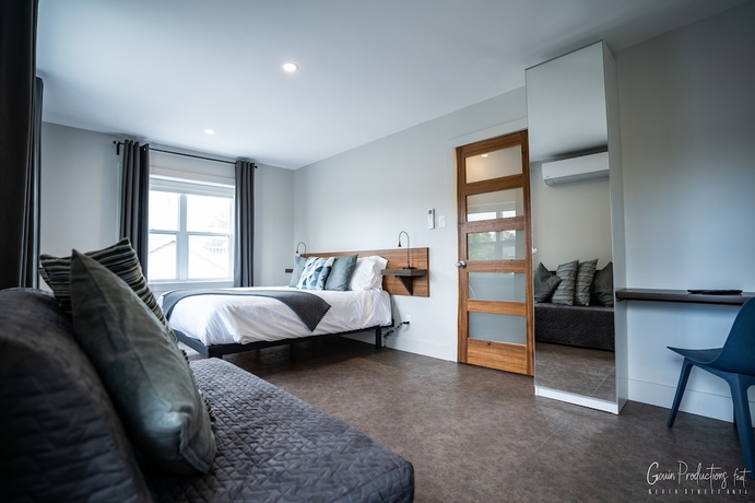 Imagen de la habitación del Hotel Morel Executive Suites. Foto 11