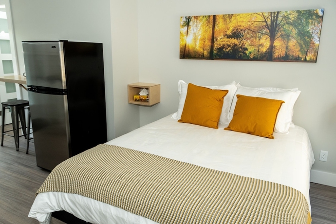 Imagen de la habitación del Hotel Morel Executive Suites. Foto 16