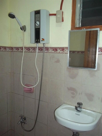 Imagen de la habitación del Hotel Moreno's Cottages. Foto 6