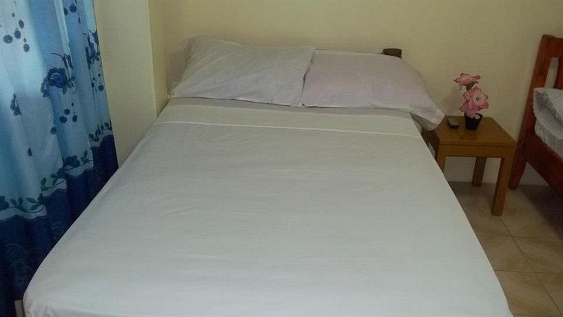Imagen de la habitación del Hotel Moreno's Cottages. Foto 7