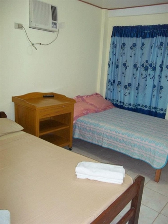 Imagen de la habitación del Hotel Moreno's Cottages. Foto 8