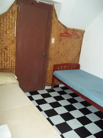 Imagen de la habitación del Hotel Moreno's Cottages. Foto 9