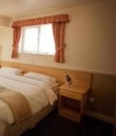 Imagen de la habitación del Hotel Moreton Park Lodge. Foto 15